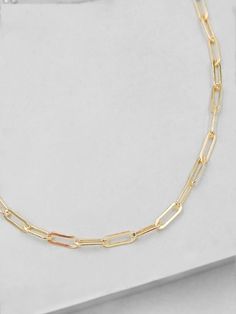 14k Gold Filled Paperclip Necklace. Length: 16�” What is gold-filled?Not to be confused with gold-plated as gold-filled contains 100x more gold than gold-plated. The thick outer layer of gold makes it highly durable and safe for people with allergies or sensitive skin. Gold-filled pieces will not turn your skin green and with proper wear and care, gold-filled pieces can last just as long as solid gold pieces. Sterling Silver Cleaner, Paperclip Necklace, Gift Wishlist, Paperclip Chain Necklace, Gold Filled Necklace, Necklace Rose Gold, Rose Gold Chain, Necklace Brands, Gold Work