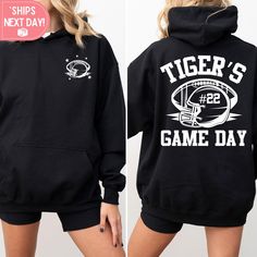 Here at Daisy May we sell the cutest Tigers Gameday Football sweatshirts! Our Sports Fan hoodies are made with the highest quality materials and every design is handmade to order using an eco friendly ink!  ♥How to order♥ *Please look through all product photos and double check your size with our size charts! *Choose the size, color and garment that you want!  *Add to cart! *Select your shipping option *Check out ♥Important info♥ *We do not accept returns or exchanges. If you are unsure if the g Fleece Hoodie With Letter Print For Sports Events, Sporty Hoodie Sweatshirt With Screen Print, Game Day Hoodie With Letter Print, Team Spirit Hoodie With Letter Print For Sports Season, School Spirit Hoodie With Letter Print For Sports Events, Team-colored Hoodie With Long Sleeves, Game Day Long Sleeve Pre-shrunk Hoodie, Team Spirit Hoodie With Graphic Print For Sports Season, Team Spirit Hoodie Sweatshirt With Letter Print