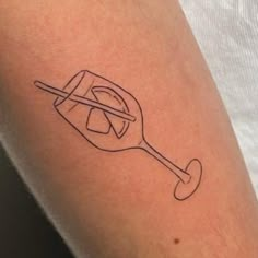 a small tattoo on the arm of a person