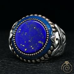 Men's Lapis Lazuli gemstone signet ring which will give you a head turning presence. This mystic, vintage style, engraved ring has a unique design for the polished, refined, and distinguished man. Perfect for casual and formal events, it will make your friends envious as you walk into the room full of confidence and pride. Looking for a unique, one of a kind GIFT FOR HIM, groomsman gift, father's day gift, teacher day gift? Look no further. This cool gemstone ring is the right answer and best gi Blue Oval Rings With Inlay, Handmade Blue Jewelry With Round Stone, Blue Bohemian Sterling Silver Gemstones, Adjustable Blue Ring With Polished Finish, Blue Turquoise Ring With Sterling Silver, Blue Turquoise Sterling Silver Ring With Stones, Symbolic Adjustable Blue Rings, Adjustable Blue Rings With Stone Setting, Adjustable Symbolic Blue Rings