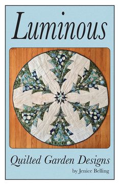 the book cover for luminouss quilted garden designs