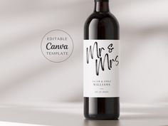 a bottle of wine with a label for mr and mrs written on the front in black ink