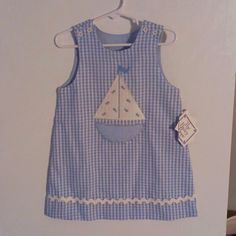 Classic Light Blue And White Sailboat Dress For Boy Or Girl White Sleeveless Nautical Dress, Blue Cotton Sailor Dress, Blue Sailor Cotton Dress, Sailor Style Blue Cotton Dress, Blue Sailor Style Cotton Dress, Spring Nautical Cotton Dress, Cotton Nautical Sleeveless Dress, Cotton Sleeveless Nautical Dress, Cute Navy Sleeveless Dress