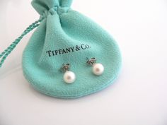 Overview:Have you been searching for a super versatile pair of earrings? One that you can use on almost any occasion and even bring with you while traveling? Well, your search is finally over! Offered for sale is a gorgeous pair of Tiffany and Co. 18K Gold Pearl Earrings. Very pretty and elegant pair! The style is classic Tiffany, making it a piece that you will most certainly use over and over again. The details of this piece is wonderful. Great piece to wear to work, or for just going to dinne Pearl Earrings Studs, Tiffany Earrings, Gold Pearl Earrings, Earrings Studs, Tiffany And Co, Gift Pouch, Pearl Stud Earrings, Gold Pearl, Tiffany & Co.