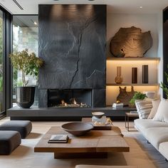 modern living room with fireplace and large windows