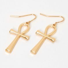 Add a touch of the Middle East to your wardrobe with these Egyptian-inspired earrings. These stylish gold-tone earrings feature an Ankh shaped design. Finish: Gold-tone Drop: 1" Closure: Fish hook Material: Metal - Claire's Gold Ankh 1" Drop Earrings Ankh Earrings, Gold Drop Earrings With Fish Hook, Nickel-free Ankh Gold Earrings, Egyptian Earrings, Egyptian Inspired, Metal Style, Shape Design, Gold Tones, Fashion Jewelry