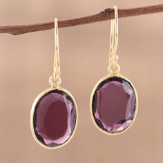 This striking pair of dangle earrings was designed by Vivek Nathany of India. A high-polished 22k gold plated sterling silver setting and hook is contrasted by rich, deep-purple, faceted amethyst gemstones for a color combination that conjures images of pure royalty, class and style. The gemstones total four carats. Shoulder Bags Pattern, Purple Earrings, Amethyst Color, Buy Gold, Amethyst Earrings, Jewelry Online Shopping, Jewelry Packaging, Gold Plated Earrings, Amethyst Gemstone