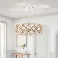 Create a cozy and elegant atmosphere in your space with this farmhouse-style ceiling fan. It's crafted from iron alloy with a weathered white finish for some coastal vibes, and it features meticulously handcrafted hemp ropes and interlocking iron wires. The barrel-shaped hollow lampshade houses seven retro-white blades and four evenly distributed light sockets. An included remote control easily manages lighting and fan functions. With six wind speeds and a silent DC motor, you can customize this Farmhouse Style Ceiling Fan, Coastal Ceiling Fan, Rope Frame, White Industrial, Weathered White, Beachcrest Home