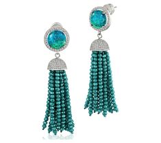 Discover the enchanting allure of the Zaxie by Stefanie Taylor Opal Belize It Or Not Tassel Earrings, where elegance meets a playful tassel design. These earrings feature a captivating blue hue center, surrounded by a crystal-encrusted cap, leading to a delicate bead tassel that dances with every move. Perfect for adding a touch of whimsy and color to your ensemble, these earrings are a testament to the joy and beauty in the details. From Zaxie by Stefanie Taylor. Elegant Blue Fringe Jewelry, Elegant Turquoise Tassel Fringe Earrings, Elegant Turquoise Tassel Earrings With Fringe, Elegant Turquoise Tassel Earrings, Turquoise Dangle Tassel Earrings For Party, Turquoise Tassel Earrings For Party, Elegant Turquoise Tassel Earrings With Dangling Beads, Elegant Turquoise Earrings With Fringe, Elegant Turquoise Earrings With Tassels