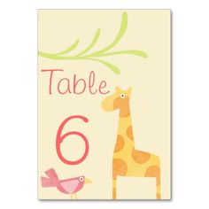 a card with a giraffe and bird sitting on it's side, says table 6