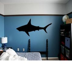 a shark wall decal in a bedroom