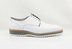 Style: 515-26-White Stylish Burnished Calfskin lace-up Derby Oxford from the Carrucci collection features soft Calfskin lining, a super lightweight Rubber Sole, and a clean welt! White Leather Lace-up Shoes With Textured Sole, White Plain Toe Lace-up Shoes For Derby, Classic White Lace-up Leather Shoes, White Fitted Leather Shoes For Spring, White Wingtip Lace-up Shoes For Work, White Lace-up Shoes With Textured Sole And Plain Toe, Spring White Oxfords For Formal Occasions, Elegant White Low-top Leather Shoes, White Lace-up Formal Shoes For Spring