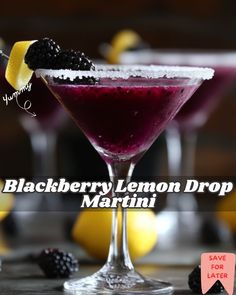 the blackberry lemon drop martini is garnished with blackberries