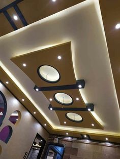 the ceiling is decorated with circles and lights