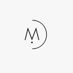 the letter m is inscribed in a circle with a black dot at the center and an arrow