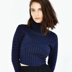 Urban Outfitters Glamorous Textured Cropped Turtleneck Sweater Small Nwt Glamorous Textured Cropped Turtleneck Sweater Sold Out Make A Statement In This Graphic Textured Turtleneck Sweater From Eclectic Manchester-Based Label Glamorous. Cropped And Fitted With Long Sleeves. Content + Care - Nylon, Polyester - Machine Wash - Imported Size + Fit - Model Is Wearing Size Small Navy Fitted Top For Night Out, Fitted Navy Top For Fall, Navy Chic Fitted Tops, Chic Navy Fitted Tops, Cropped Turtleneck Sweater, Open Weave Sweater, Cropped Turtleneck, Tall Sweater, Ruffle Sweater