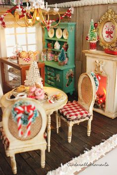 a doll house with furniture and decorations in it