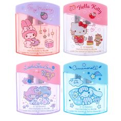 three different colored plastic boxes with hello kitty designs on the front and back, one for each