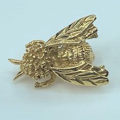 Bumble Bee Pin 14k Yellow Gold Brooch Insect Jewelry Metal: 14k Yellow Gold Weight: 4.4 Grams Stamps: 14k Closure: Bar Pin, Spinner Clasp Measurements: 21.2 X 15.4 X 9.5mm Bee Pin, Bee Brooch, Insect Jewelry, Gold Brooch, Jewelry Metal, Gold Brooches, Bumble Bee, Gold Yellow, Metal Jewelry