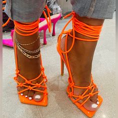 Shane Justin Strappy Lace Up Heels New . Super Cute . Knotted Detail . Strappy Lace Up . New Without Box . Squared Toe . Bright Orange . Neon . Size 37 . 7 Usa . Heel 5 Inch . Orange Strappy Heels, Shane Justin, Arm Candies, Slippers Heels, Orange Heels, Cap Decoration, White Leather Sandals, Fashion Shoes Heels, Thigh Tattoos