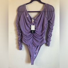 New Never Worn Fashion Nova Ruched Sleeve Long Sleeve Snap Crouch Mesh Bodysuit Size: 1x Color: Lavender Minor Lavender Lines On Front Of Bodysuit (See Photos) Please Serious Inquiries Only Thanks !! Ruched Solid Color Bodysuit For Spring, Solid Color Ruched Bodysuit For Spring, Summer Ruched Bodysuit For Night Out, Spring Ruched Bodysuit For Night Out, Ruched Bodysuit For Night Out In Spring, Spring Party Ruched Bodysuit, Spring Stretch Ruched Bodysuit, Long Sleeve Ruched Bodysuit For Night Out, Purple One-piece Bodysuit For Party