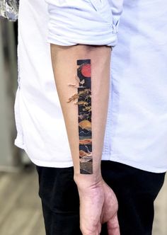 a person with a tattoo on their arm