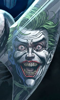 a close up of the face and head of a joker