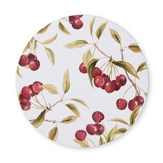 a plate with cherries and leaves on it