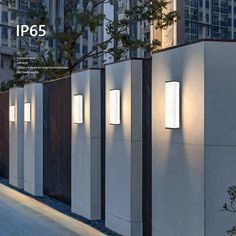 an advertisement for the ip65 lighting system is shown in front of a row of tall buildings