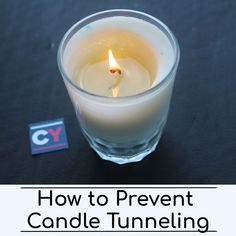 a candle with the words how to prevent candle tunneling in front of it on a black surface