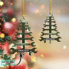 two christmas tree ornaments with wrenches hanging from the top and custom text on each ornament