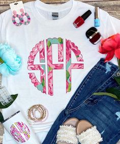 Your favorite Lilly Inspired looks now in a scallop monogram version! This fun floral print monogram tee is so cute and fun to style! Pair with your favorite jeans or chino shorts and bold, bright accessories!

GILDAN
Short Sleeve - 6.0 oz. pre-shrunk 100% cotton Spring Casual T-shirt With Monogram Print, Casual Monogram Print T-shirt For Summer, Summer Monogram Print Tops, Summer Cotton Tops With Monogram Print, Summer Cotton Monogram Print Tops, Trendy Cotton Tops With Monogram Print, Relaxed Fit Monogram Print Summer Tops, Pink Monogram Cotton Top, Pink Monogrammed Cotton Top