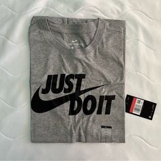 Bnwt, 2nd Photo So You Can See Whole Shirt. Standard Fit 50% Cotton/50% Polyester Nike T-shirt With Text Print For Sports, Nike Gray Graphic Print Top, Nike Athletic Heather Graphic Print Top, Nike Graphic Print T-shirt In Athletic Heather, Nike T-shirt In Athletic Heather With Logo Print, Nike Tops In Athletic Heather With Logo Print, Nike Athletic Heather T-shirt With Logo, Gray Sportswear T-shirt With Graphic Print, Nike Gray T-shirt With Logo Print