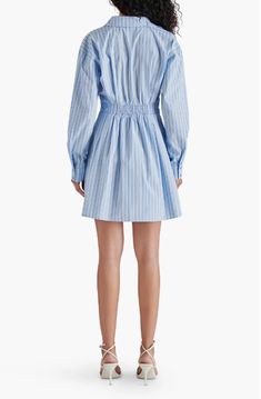 Details & care This crisp poplin shirtdress is updated in a leggy lengthy with a shaping smocked back. 33 1/2" length Side-zip closure Spread collar Long sleeves with two-button cuffs Lined 68% polyester, 24% cotton, 8% rayon Hand wash, dry flat Imported Item #10221234 Fitted Light Blue Shirt Dress For Daywear, Light Blue Fitted Shirt Dress For Daywear, Light Blue Cotton Shirt Dress For Daywear, Spring Smock Dress For Work, Aria Dress, Dress Light Blue, Corset Waist, Kimono Jacket, Sweater Sale