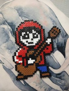 an image of a pixellated character on a piece of art that is made out of legos