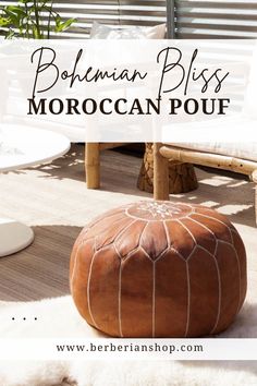 a brown ottoman sitting on top of a white rug