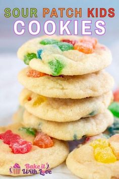 a stack of cookies with the words sour patch kids cookies in front of it and gummy bears on top