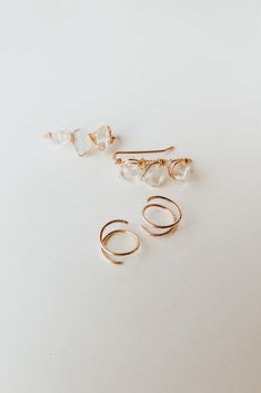 These 14k gold filled or sterling silver earrings are soon to be your go-to pieces. Opalite stones wire wrapped on a 14k gold filled bar create the perfect statement piece earrings. And little Twist Earrings that are dainty and minimalistic. https://thirtynineonetwenty.com/product/twist-earrings/ #handmadeearrings #goldearrings #minimalistjewelry #jewelry #womensjewelry #goldfilledearrings #climberearrings #womensearrings #daintyearrings #daintyjewelry #simplejewelry #partyearrings #hoopearrings Elegant Adjustable Wire Wrapped Ear Climbers, Minimalist Adjustable Crystal Earrings, Elegant 14k Gold-filled Nickel-free Cartilage Earrings, Dainty Wrap Drop Earrings With Ear Wire, Dainty Drop Wrap Earrings With Ear Wire, Elegant Gold Wire Wrapped Cartilage Earrings, Minimalist 14k Gold Filled Wrap Earrings As Gift, Minimalist 14k Gold Filled Wrap Earrings, Minimalist 14k Gold-filled Wrap Earrings