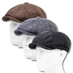 three hats on mannequin heads with one wearing a hat and the other without