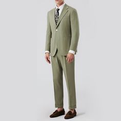 The Men's Slim Fit Sage Green Suit is the epitome of wedding day style. With its unique sage green hue, this suit adds a fresh and natural elegance to the groom's look. Meticulously tailored with refined details, it promises sophistication. Whether in a garden, on the beach, or in a traditional church ceremony, this suit seamlessly integrates into any setting, making it a standout choice for creating memorable wedding moments. Material: 35% Rayon / 65% Polyester Care Instructions: Machine wash / Tailored Green Three-piece Suit For Groom, Green Notch Lapel Suit For Groom, Spring Suits For Grooms, Green Notch Lapel Blazer For Wedding, Tailored Green Wedding Blazer, Tailored Suits For Groom In Spring, Spring Tailored Suit For Groom, Spring Notch Lapel Suit For Groom, Elegant Tailored Khaki Suit