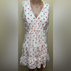 -Approximately 33.5” Length -Approximately 31.5” Bust -97% Polyester / 3%Spandex -Hand Wash Cold -Corrugated Fabric -Adjuster Strap At The Top Of The Front -V Neck -Sleeveless -It Has 2 Finely Woven Horizontal Lines Of Thread Polka Dot Knee-length Sleeveless Dress For Spring, Polka Dot Sleeveless Sundress For Spring, Polka Dot Sundress For Spring, Fitted Polka Dot Sleeveless Sundress, Polka Dot Sleeveless Lined Dress, Fitted Polka Dot Sleeveless Dress For Spring, Polka Dot Sleeveless Daywear Dress, Sleeveless Lined Orange Dress, Spring Sleeveless Orange Knee-length Dress