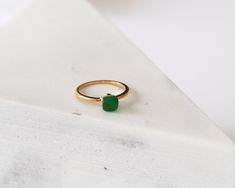 W H A T ∙ M A K E S ∙ T H I S ∙ S P E C I A L This unique green stone ring is meticulously handmade in the ARAN JEWELS studio, Crafted of 925 Sterling Silver. That ring is perfect for stacking or worn alone for a classic minimal look. DAINTY SOLITAIRE GREEN DESIGN - we use only the finest quality materials - all components are 100% sterling silver or 18k Gold plated (Nickel free) - all pieces are designed in our happy studio D E T A I L S - Available in sterling silver or Crafted in Gold plated Ring Green Stone, Green Stone Ring, Dainty Choker Necklace, Padlock Necklace, Thick Chain Necklace, Green Ring, Green Stone Rings, Tiny Hoop Earrings, Dainty Choker