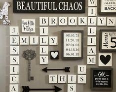 the wall is decorated with many different types of signs and magnets, including one that says beautiful chaos