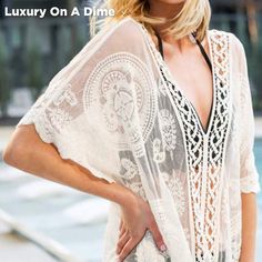 Bohemian Sheer V-neck Cover-up, Bohemian Lace Beach Cover-up, V-neck Beach Dress With Lace Trim As Cover-up, Summer Beachwear Cover-up With Lace Trim, Lace Beachwear Cover-up For Beach, Bohemian Lace Patchwork Summer Cover-up, Sheer Lace Beachwear Cover-up, Bohemian Lightweight Cover-up For Beach Party, Elegant Summer Kaftan For Vacation