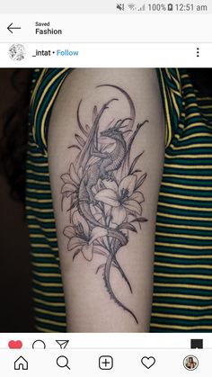 a woman's arm with flowers and a dragon tattoo on the left side of her arm