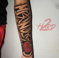 a person with a tattoo on their arm