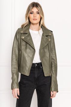 Classic, edgy, and oh-so-flattering, the Donna biker jacket is the wardrobe staple you’ve been waiting for. With its sharp notch lapels, zippered sleeves, and asymmetrical zipper, this iconic top-piece offers vintage appeal with a flawlessly tailored fit. Designed with premium leather that only becomes more appealing with age, the Donna is guaranteed to stick around. Wishlist 2022, Leather Jacket Girl, Leather Outerwear, Biker Jackets, Leather Biker Jacket, Olive Color, Women Leather, Biker Jacket, Wardrobe Staples