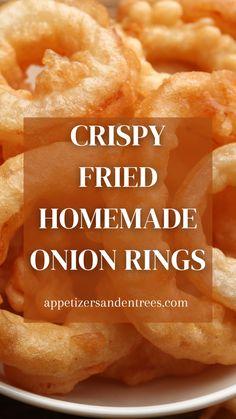 crispy fried homemade onion rings in a white bowl with the words crispy fried homemade onion rings