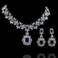 For edgy style and sophisticated sparkle, this necklace set is a dream come true! Elegant and shimmering set with CZ and sapphire stones creating a flawlessly fresh finish for each and every one of your evening ensembles. The set includes a necklace and a pair of beautiful earrings. Approximate earrings length is 2.1". Designed over a high-quality brass as base metal. Available in 3 plating options. Almina Set (Silver) is in-stock & ready-to-ship. Delivery time frame for other options is 5-7 wee Sapphire Jewelry Set, Unique Gift Cards, Sapphire Stones, Heritage Jewellery, Edgy Style, A Dream Come True, Faux Stone, Waist Chain, Makeup Designs