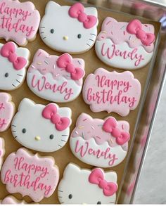 hello kitty decorated cookies with pink bows and happy birthday written on them in frosting